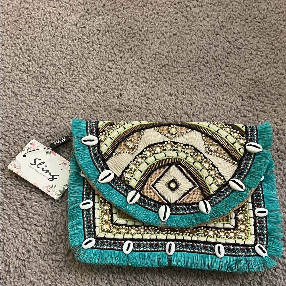 Beaded Clutch with Fringe and Shell Accents